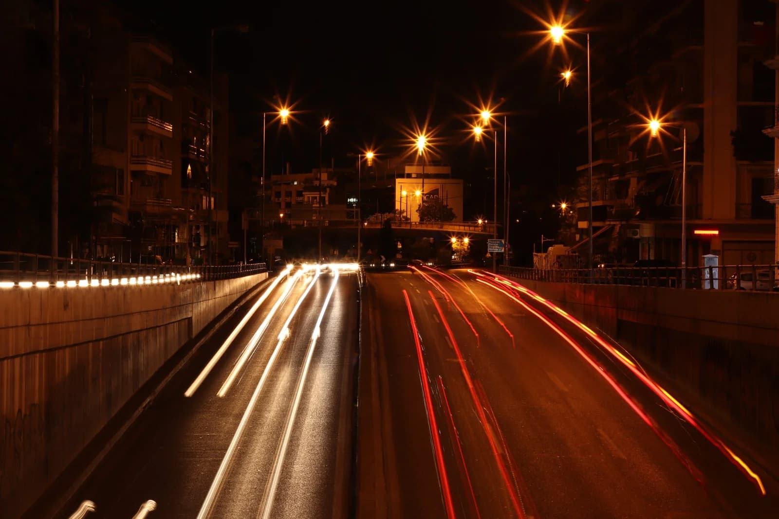 Highway at night with light trails